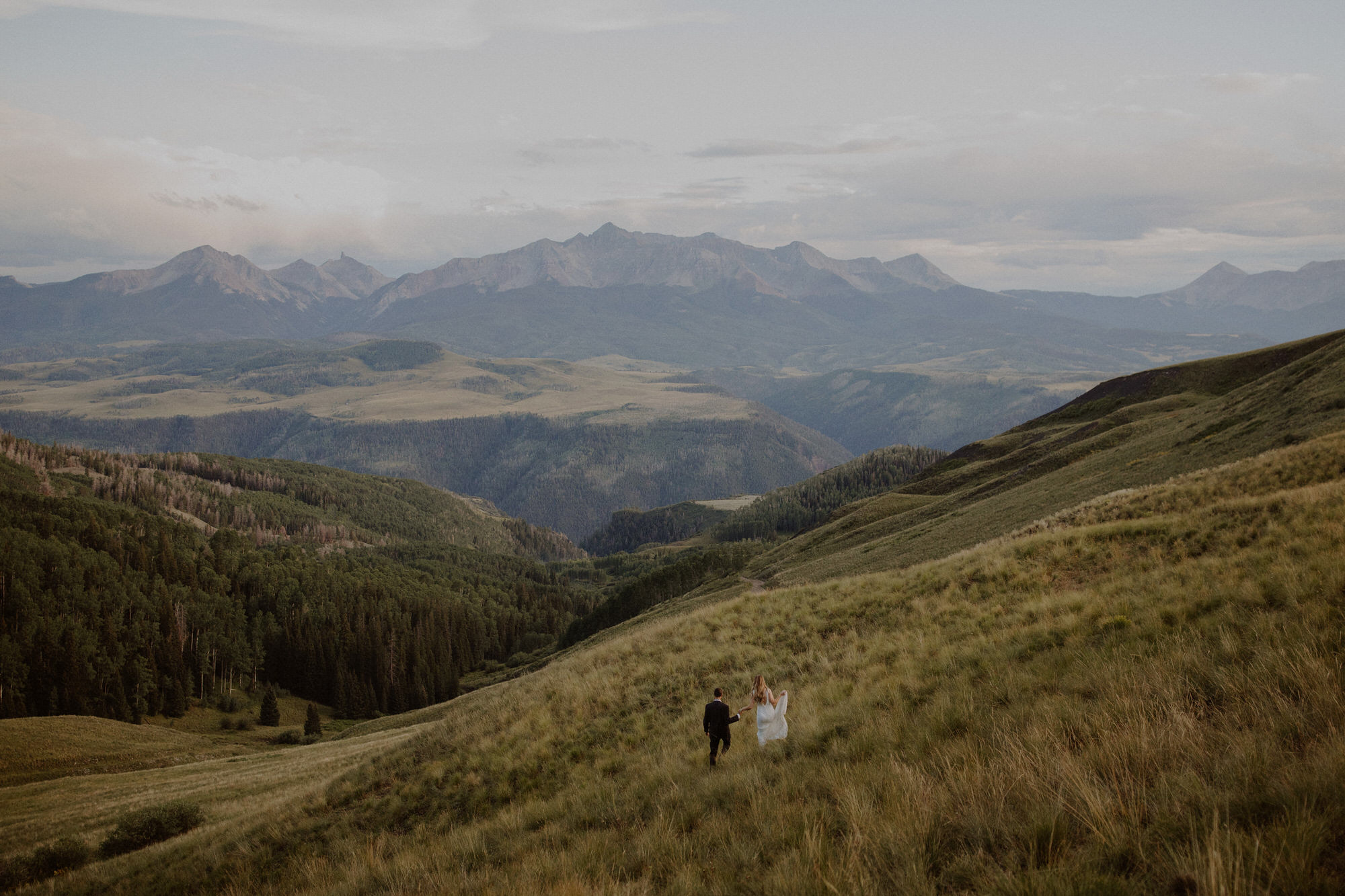 A couple walks together during their Colorado elopement